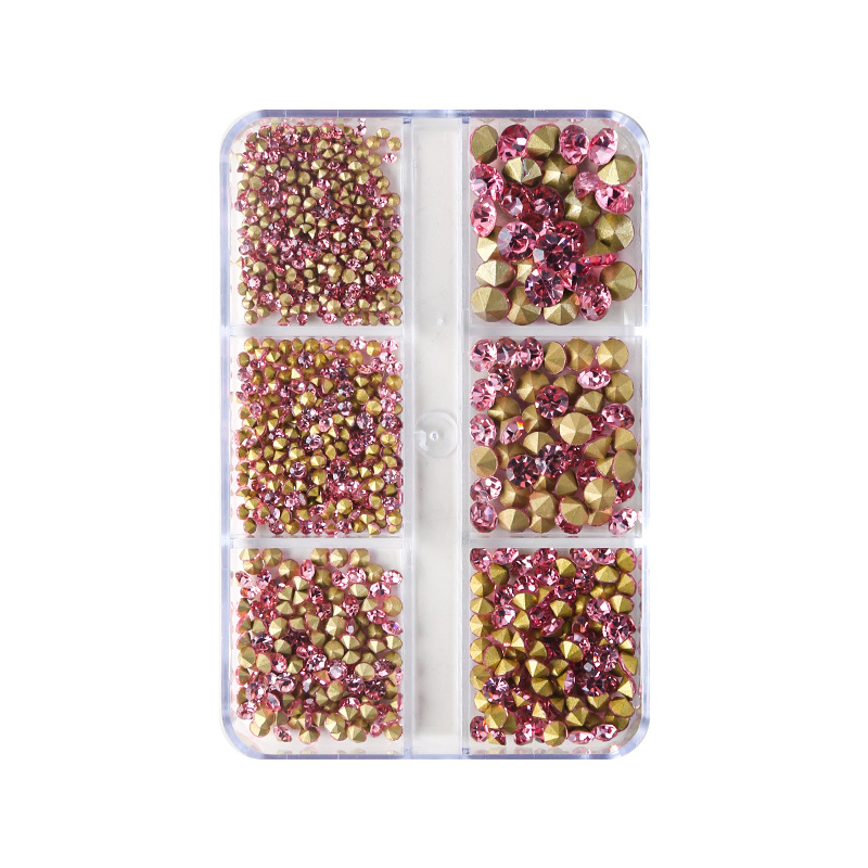 Nail jewelry, white diamonds on gold background, AB colored diamonds, culets, 6 compartments, boxed mixed size, size nails, pointed diamonds. 
