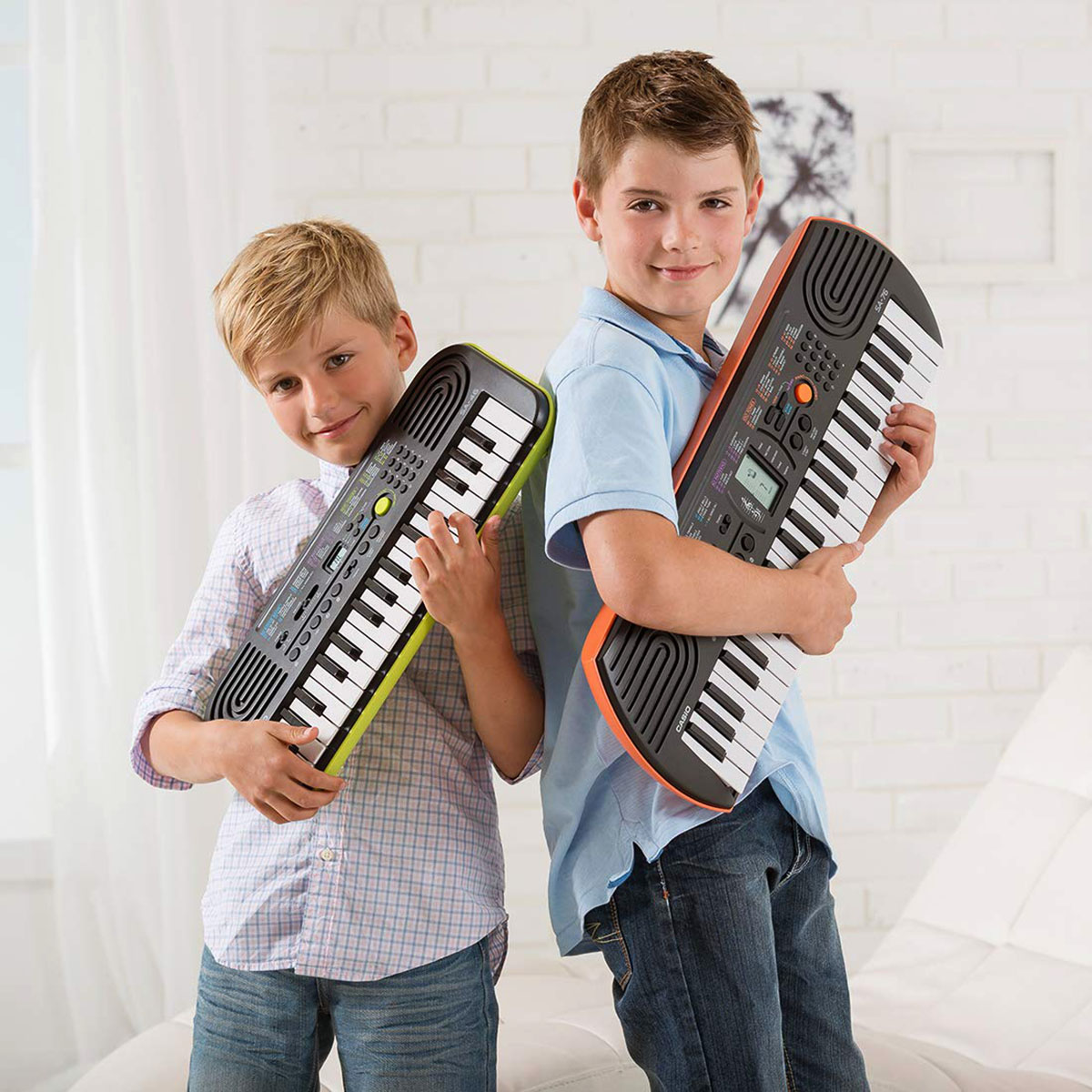 Casio SA-77 Portable Musical Keyboard Piano - Black & Grey with adapter. 