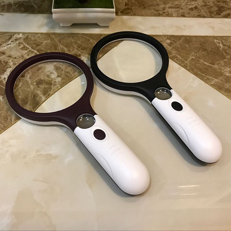 Jinghui manufacturers creative four LED light racket double light lens reading handheld 108mm magnifying glass 70108AB