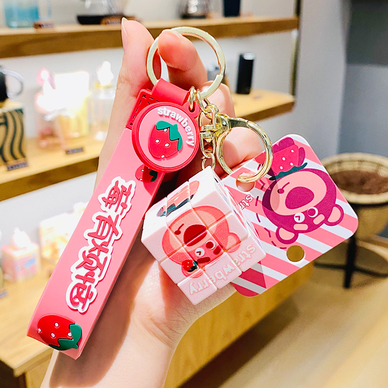 Genuine strawberry small animal rubik's cube rabbit creative car key chain school bag pendant pair small gift wholesale