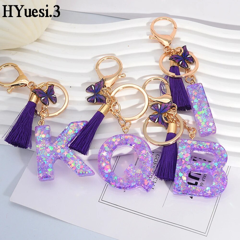 Glitter 26 Initials Name Keychain Purple Color Sequin Filled Letter Key Ring With Tassel Butterfly For Women Backpack Bag Decor. 