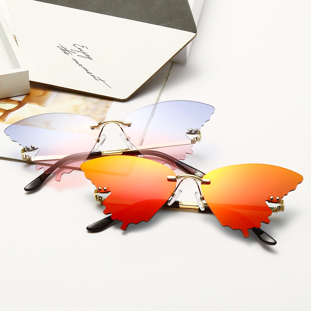 Luxury Fashion Fire Flame Sunglasses Women Rimless Wave Sun Glasses Metal Shades For Vintage Women Mirror Eyewear UV400. 