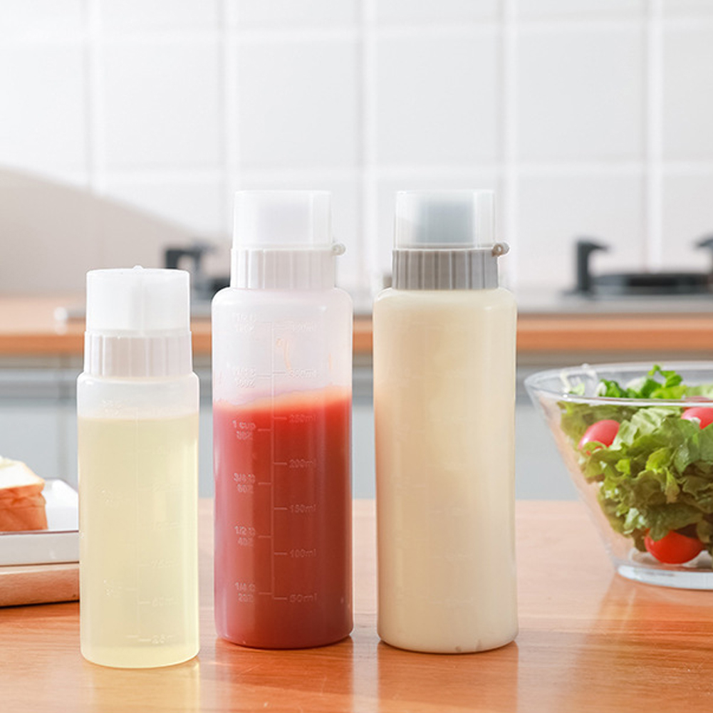 （New）Multifunction 5 Hole alad queeze Bottle Ketchup Container with cale Honey Jam Refillable Condiment auce queeze Bottle. 
