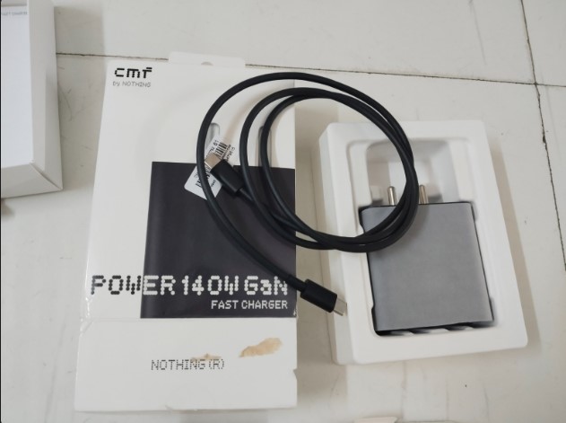 CMF by Nothing 140 W Power GaN 5 A 3 Port Mobile Charger with Detachable Cable  (Dark Grey, Cable Included). 