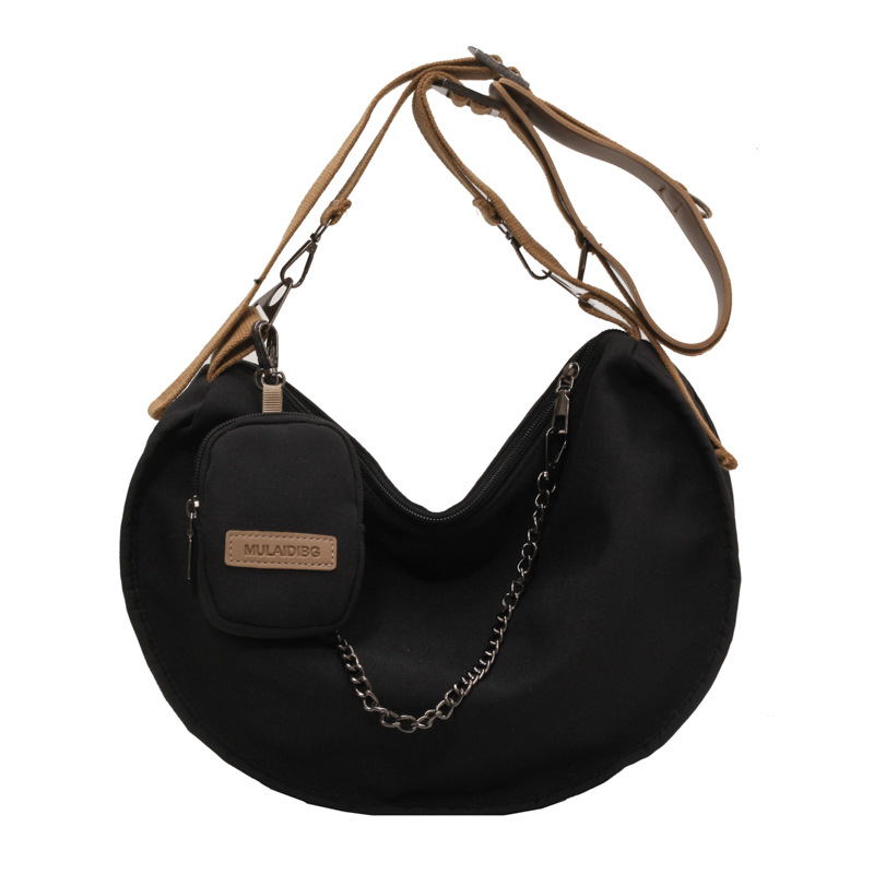 Canvas bag women's winter versatile Han Yunuo new large-capacity shoulder red crossbody bag niche simple dumpling bag. 