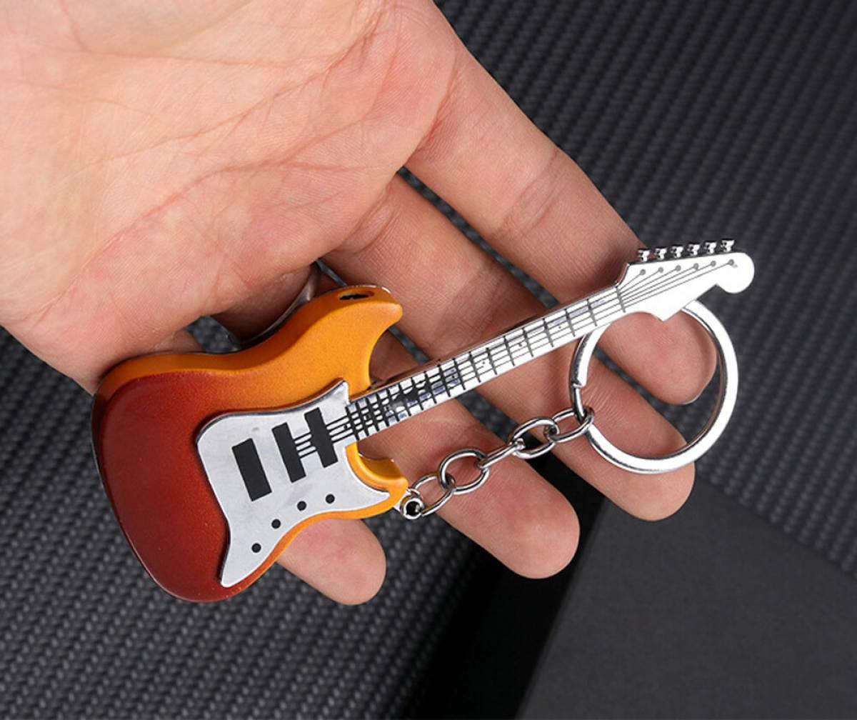 Novelty Guitar Lighter: Mini Metal Torch with Striking Guitar Design - Perfect Men's Gift for Windproof and Butane-Powered Convenience. 