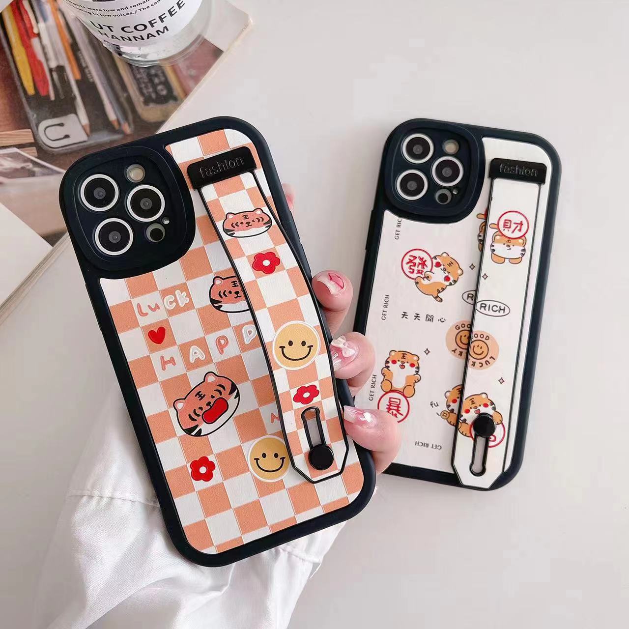 Fine Hole Wrist Strap Suitable iPhone15 Phone Case Apple 14Pro Cartoon bracket XSMAX Leather Protective Cover. 