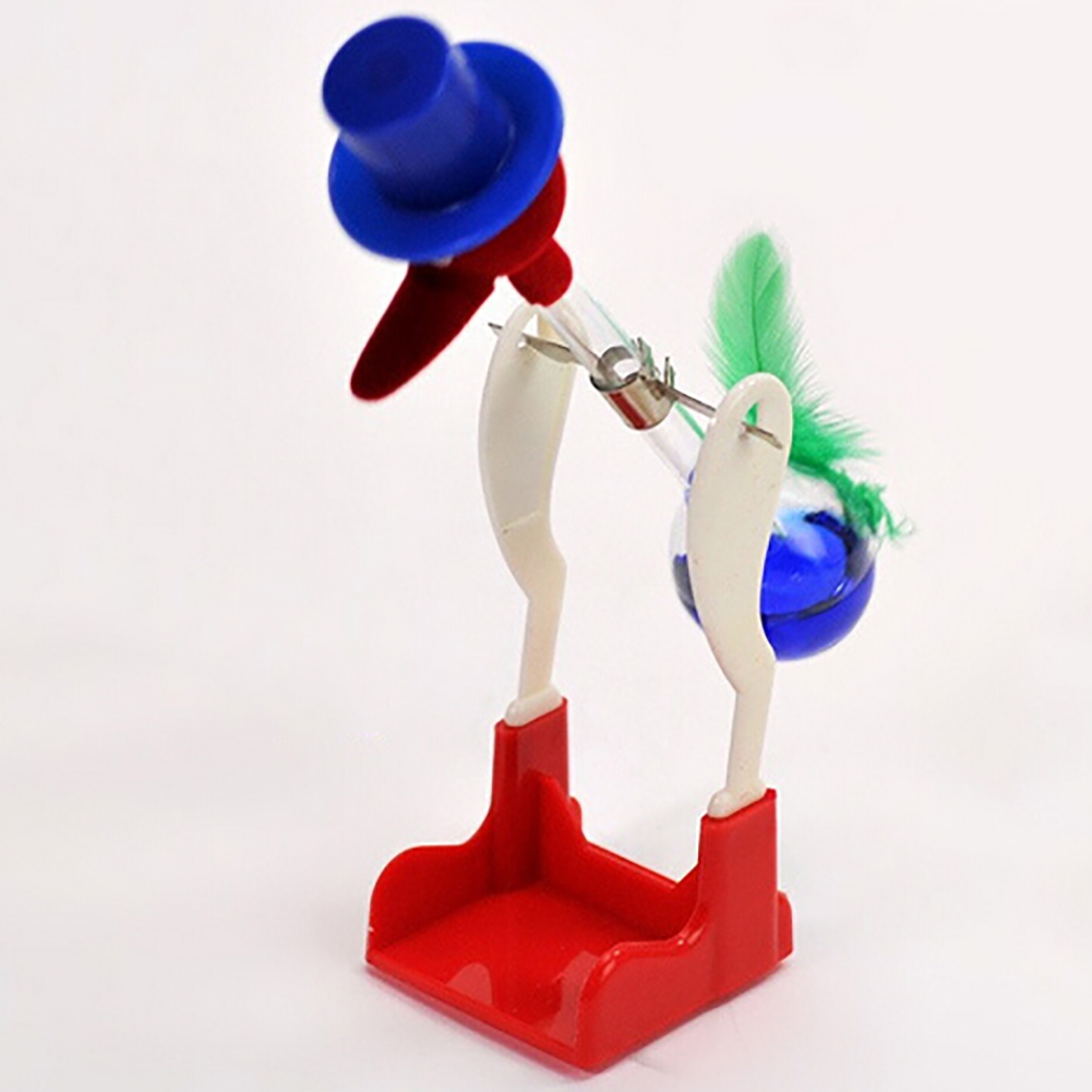 （New）Creative Non-top Liquid Drinking Gla Lucky Bird Duck Bobbing Magic Prank Toy. 
