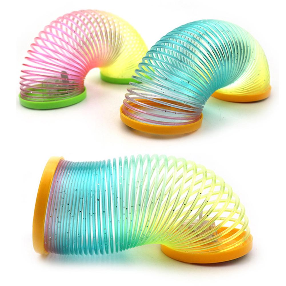 SF 1Pc Glow in Dark Walking Rainbow Spring Toy Circle Slinky Kid Magic Luminous Slinky Rainbow Spring Magic Circle Stretchy #432190. 