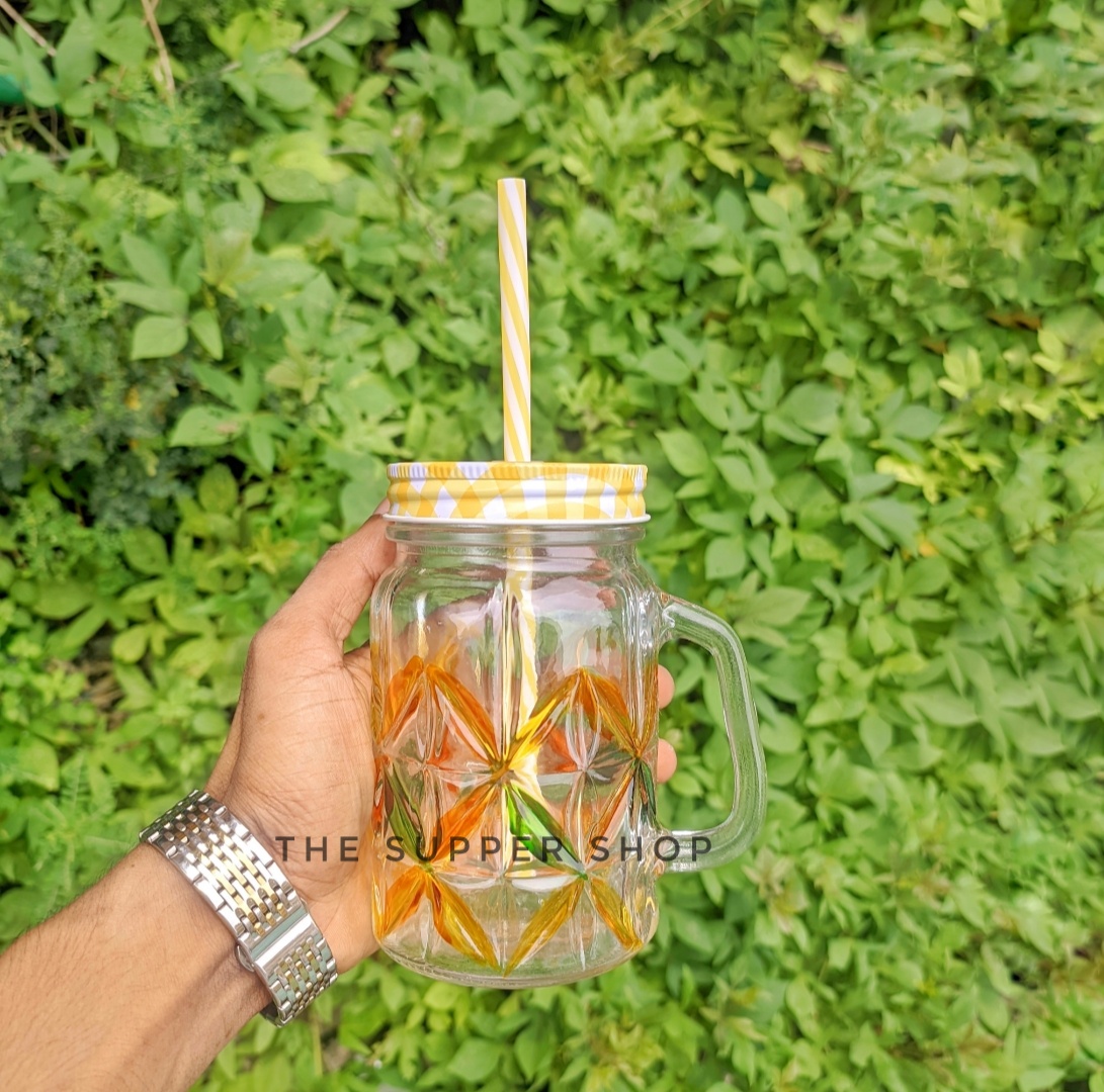 Mason Jar Mugs with Handle, multicolored Lids and Plastic Straws. 