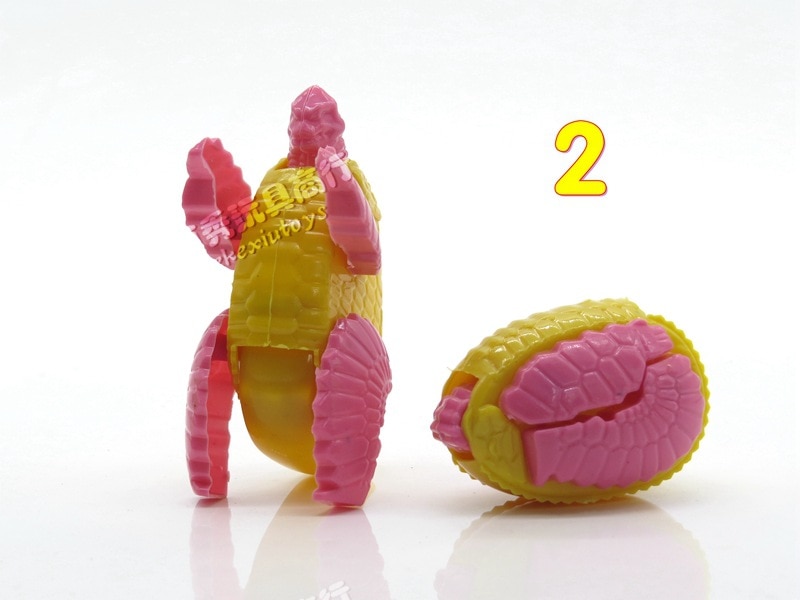 Random 2 pieces action figure mini Anime transformation monster dinosaur eggs deformation robot Gashapon kids educational toys. 