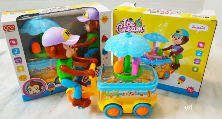 Monkey Ice Cream Cart Toy Bump and Go with Music and Lights. 