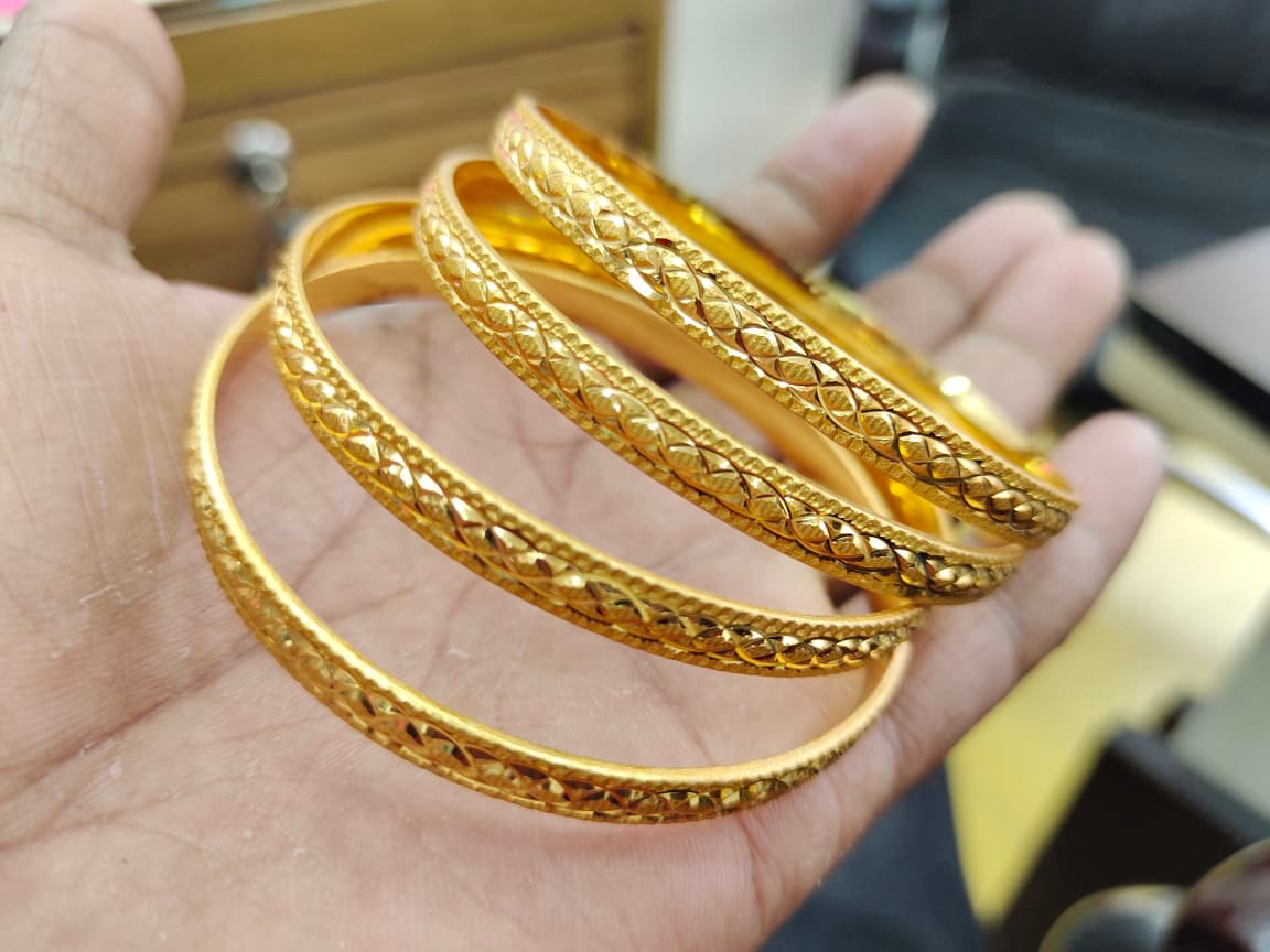Indian City Golden Yellow Metal Bangles 4 pcs. Bangles Or Curi For Women