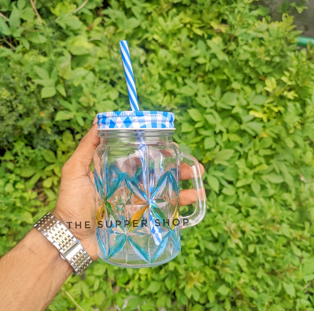 Mason Jar Mugs with Handle, multicolored Lids and Plastic Straws. 