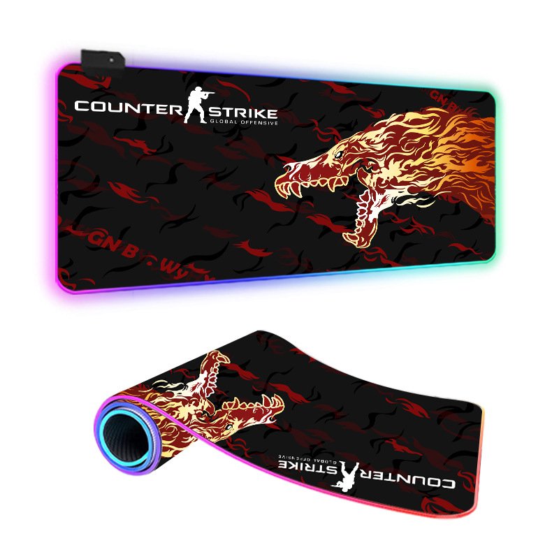 Cross-border heat map RGB luminous mouse pad large thickened LED light dazzling gaming keyboard table mat factory direct supply. 