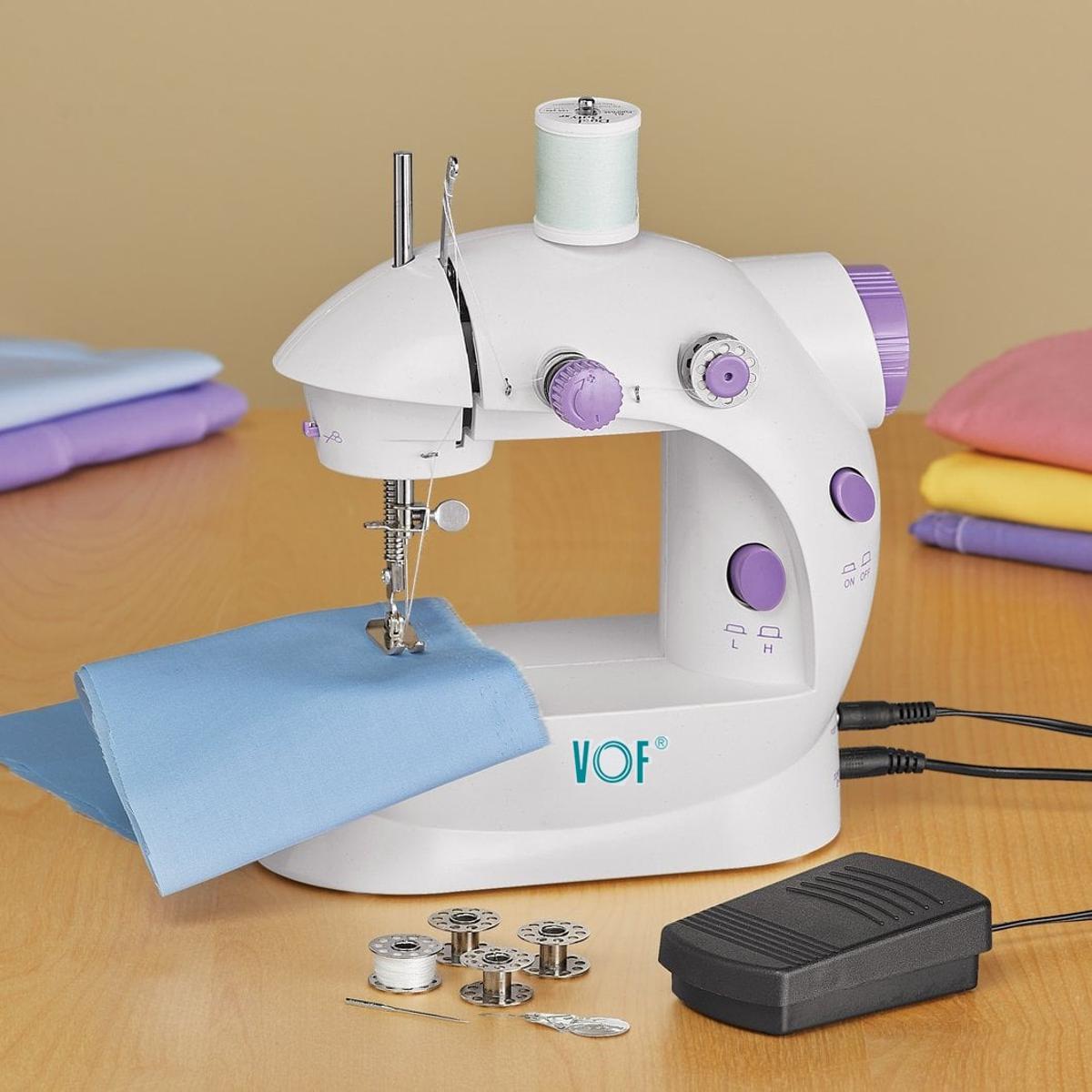 8 in 1 Mini Sewing Machine - Dual Speed Portable Mini Electric Pedal Double Threads Rewind Swing Machine. 