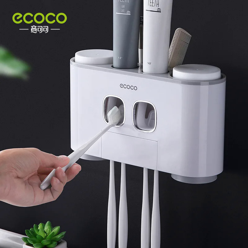 ECOCO Automatic Toothpaste Squeezers Wall Mounted Toothpaste Dispenser Dustproof Toothbrush Holder Bathroom Accessories for Home. 