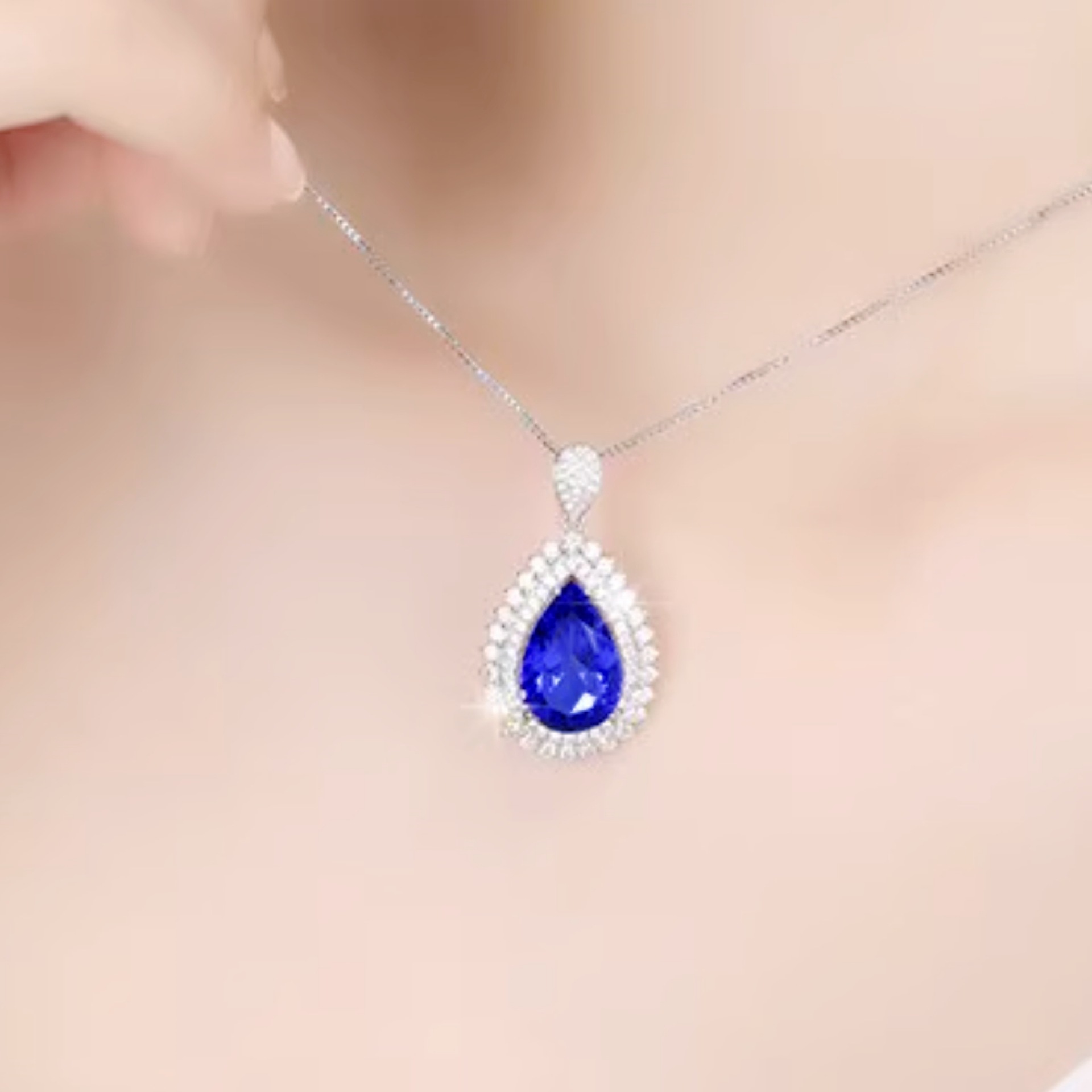 Douyin live sparkling luxury pear-shaped pendant inlaid tanzanite high carbon diamond ruby pendant clavicle chain. 