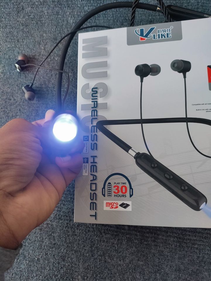 {New} (FREE) Brand VK-Like, VK-B730 premium quality Bluetooth Neckband with 30 hours play time and only 2 hours charging (Type-C) contains 3 options for white LED light & super durability and supports micro sd card. 