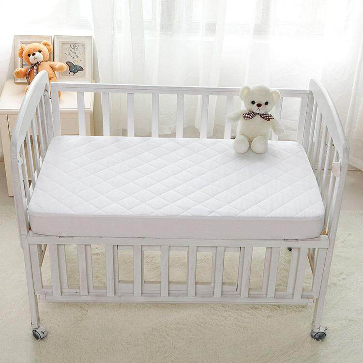 Protect a bed 2025 crib mattress protector