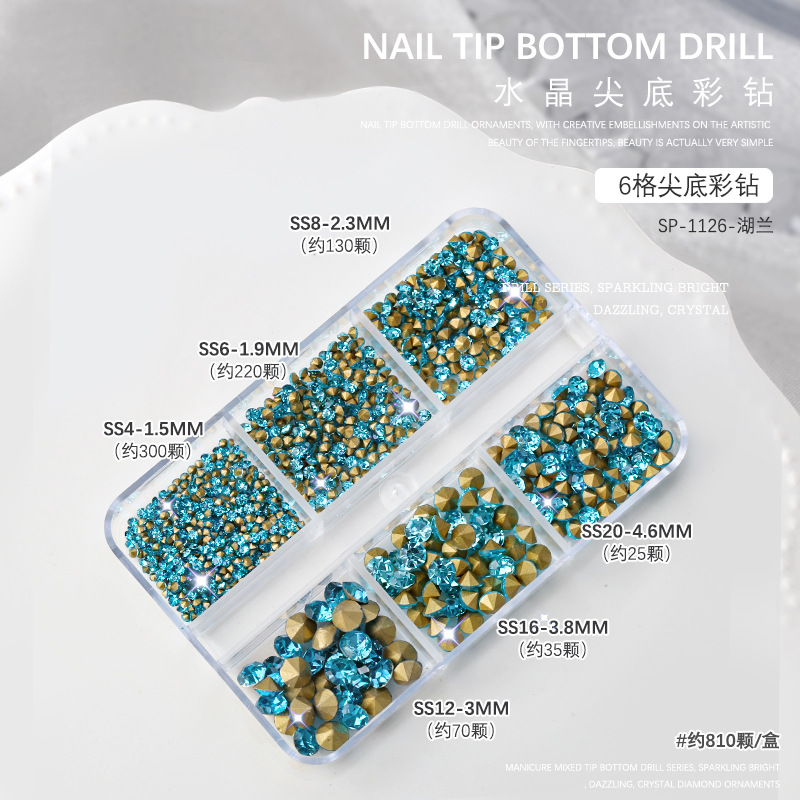 Nail jewelry, white diamonds on gold background, AB colored diamonds, culets, 6 compartments, boxed mixed size, size nails, pointed diamonds. 