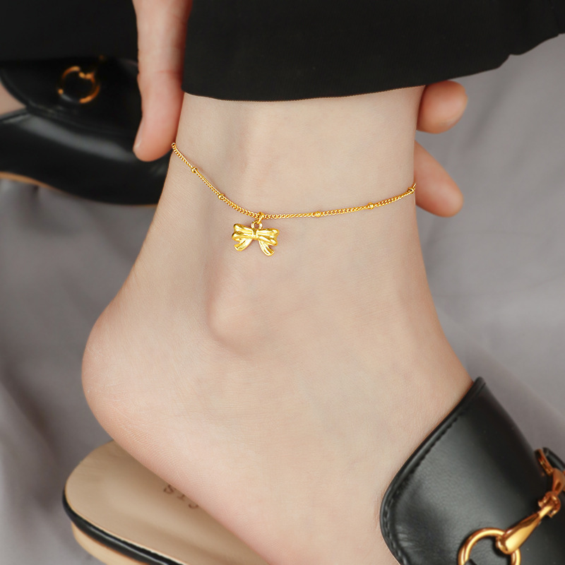 Exquisite light luxury fugitive princess bow anklet titanium steel plated 18K gold non-fading versatile simple gift anklet