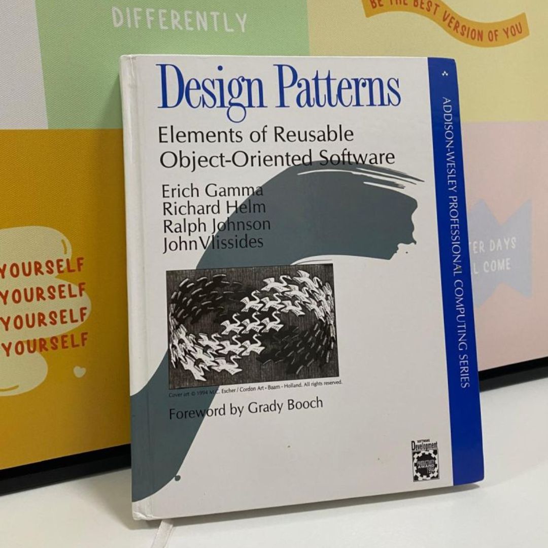 Design Patterns: Elements of Reusable Object-Oriented Software  by Erich Gamma , Richard Helm , Ralph Johnson , John Vlissides , Grady Booch (Foreword) , First Edition. 