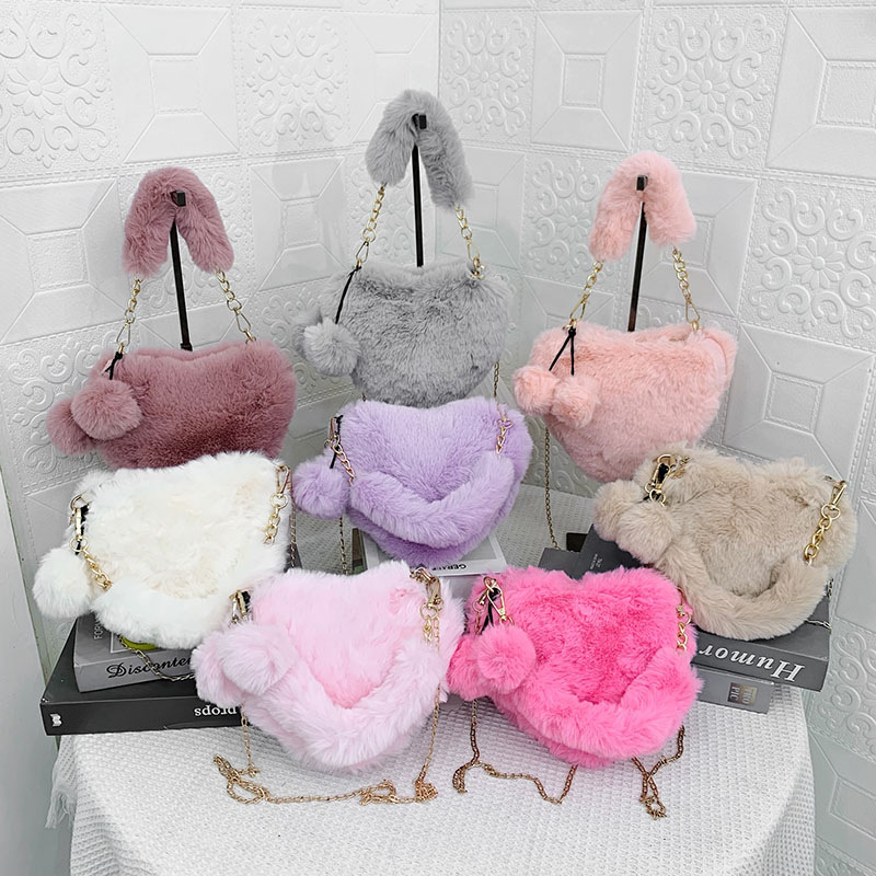 Korean version of plush heart-shaped peach heart bag autumn and winter new plush bag ins one-shoulder cross-body hand-chain women's bag. 