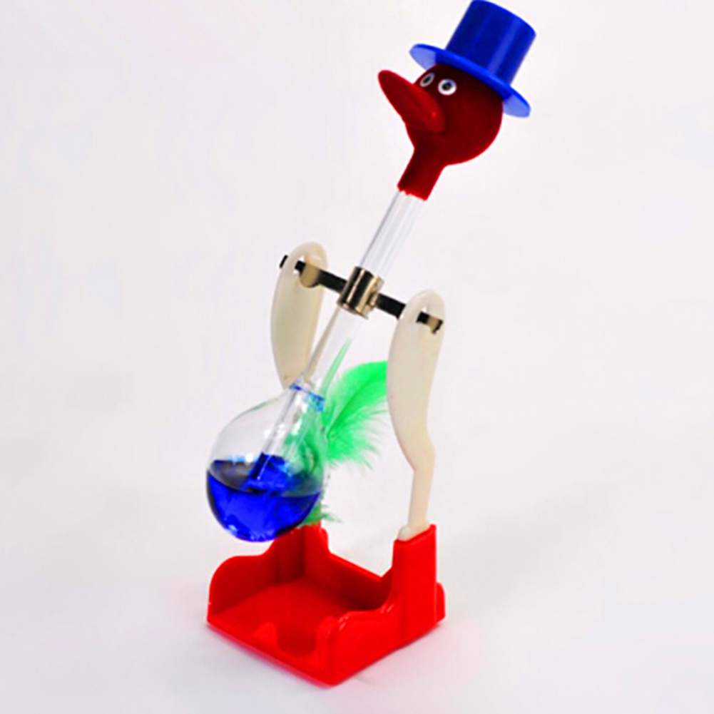 （New）Creative Non-top Liquid Drinking Gla Lucky Bird Duck Bobbing Magic Prank Toy. 