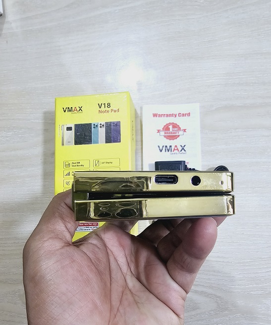 Vmax V18 Notepad Fold Phone With Warranty. 