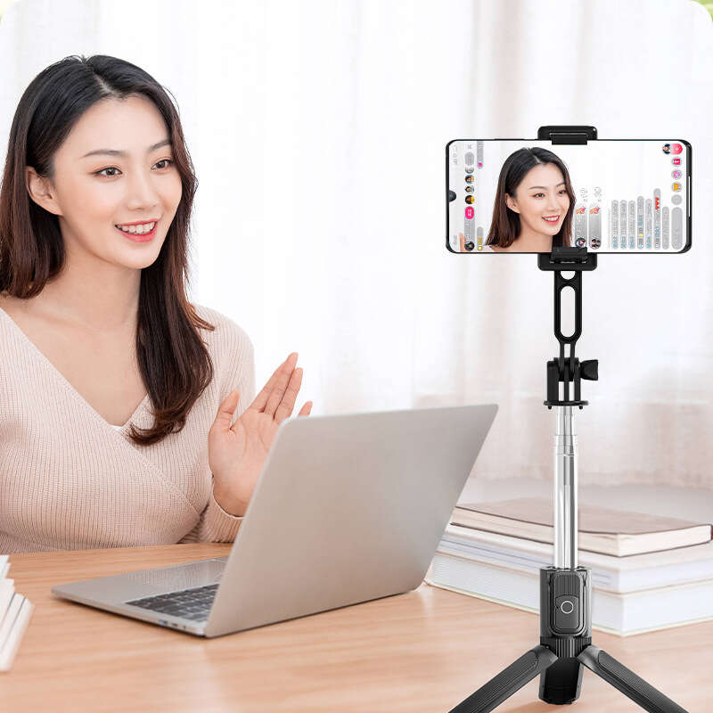 New mini Bluetooth pocket phone holder horizontal and vertical selfie stick 360 degree rotation QQ e. 