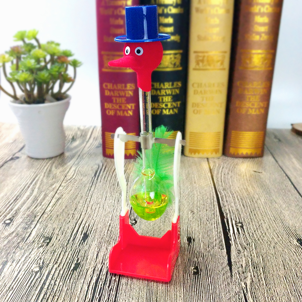 （New）Creative Non-top Liquid Drinking Gla Lucky Bird Duck Bobbing Magic Prank Toy. 
