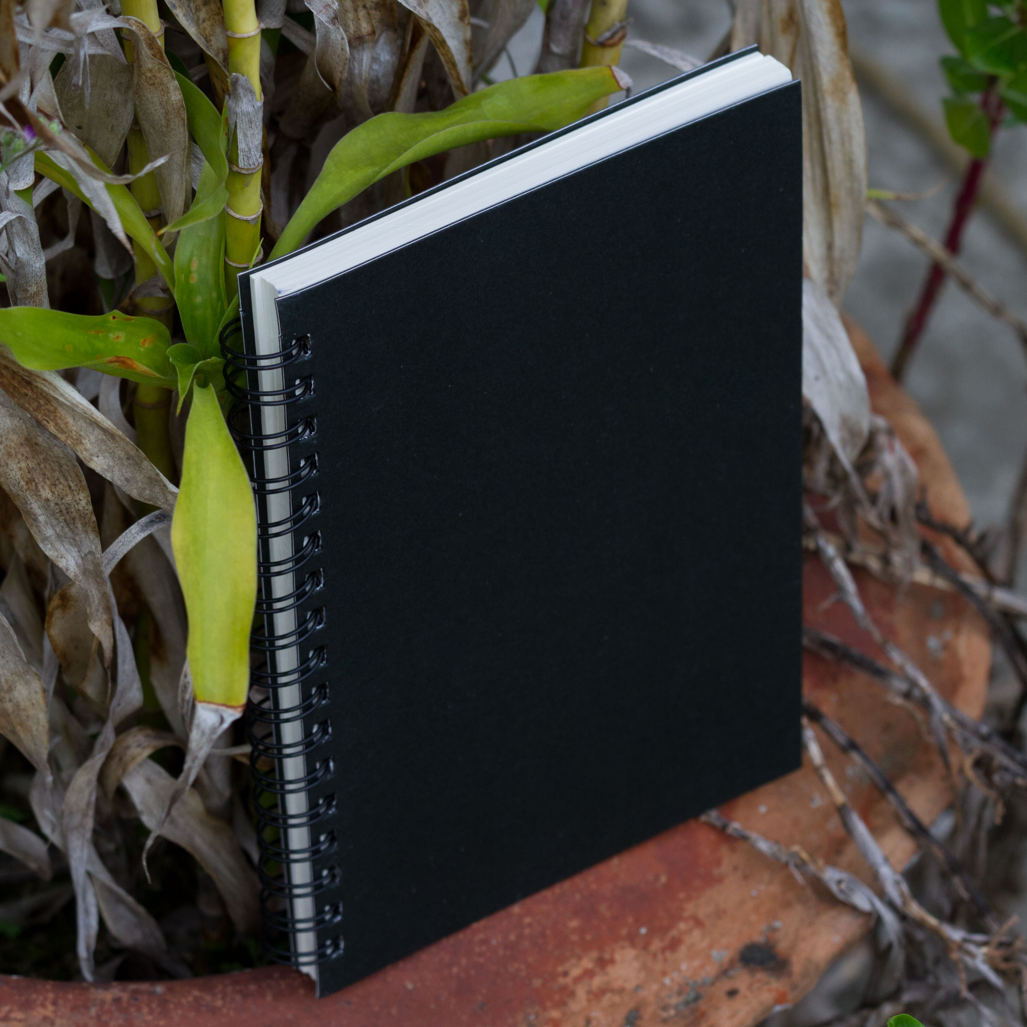 Executive Series Black Spiral Compress Notebook. 