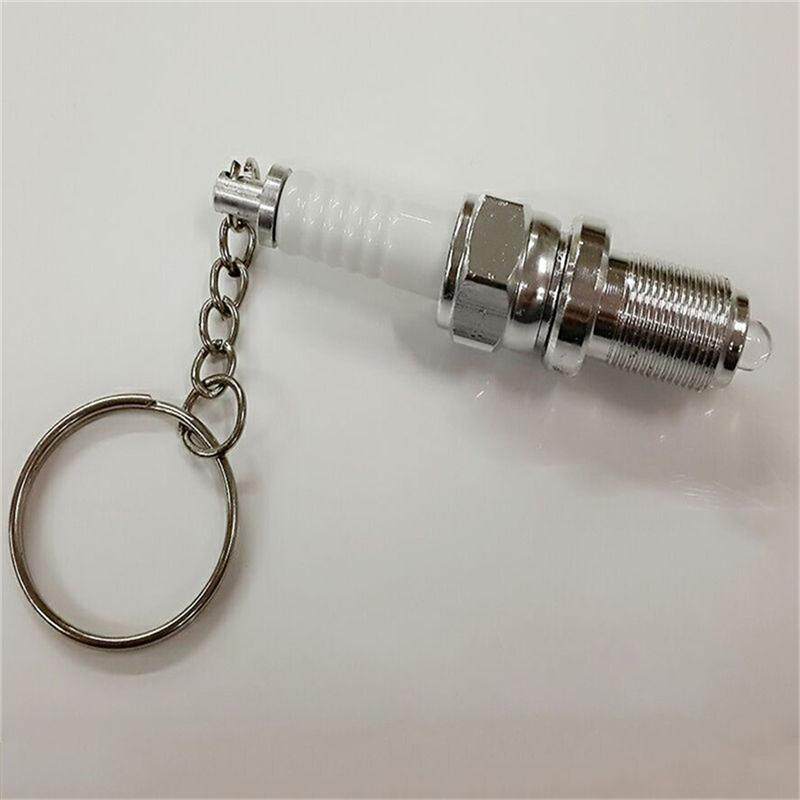 Graceful Casual Fashion LED Key Chain Spark Plug Key Chain Keychain Car Parts Keyring. 