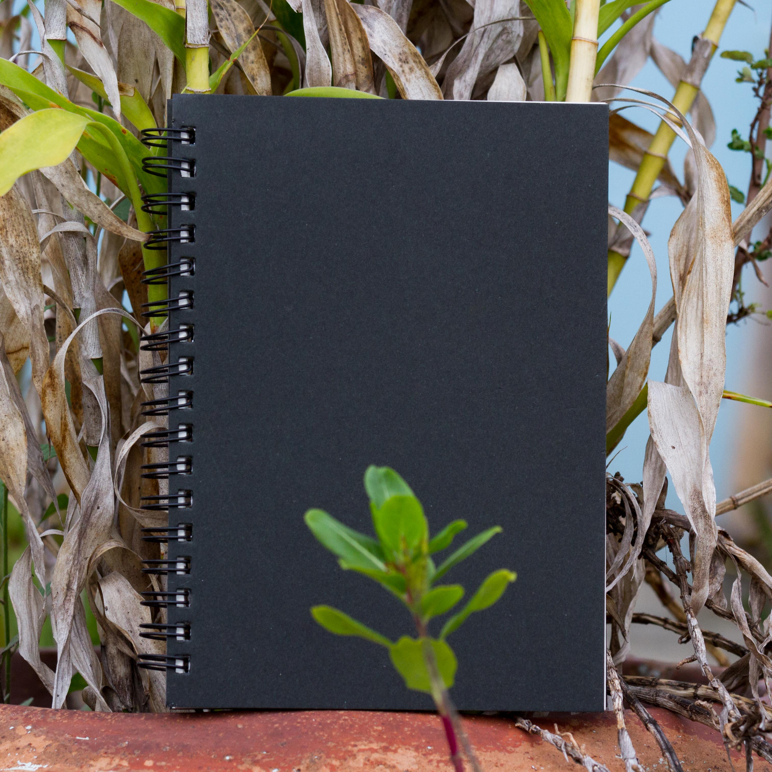 Executive Series Black Spiral Compress Notebook. 