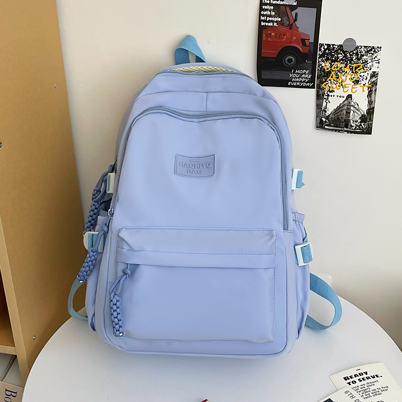 College student school bag cream solid color Japanese college style ins girl backpack high school student simple and versatile backpack. 