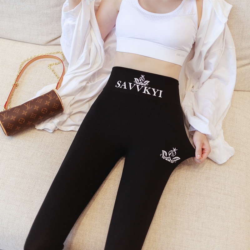 The new cotton printed leggings in summer are worn by women outside the thin high-waisted stretch cropped seamless tight yoga to look thinner