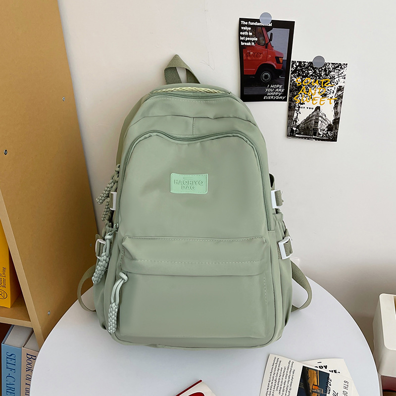 College student school bag cream solid color Japanese college style ins girl backpack high school student simple and versatile backpack. 