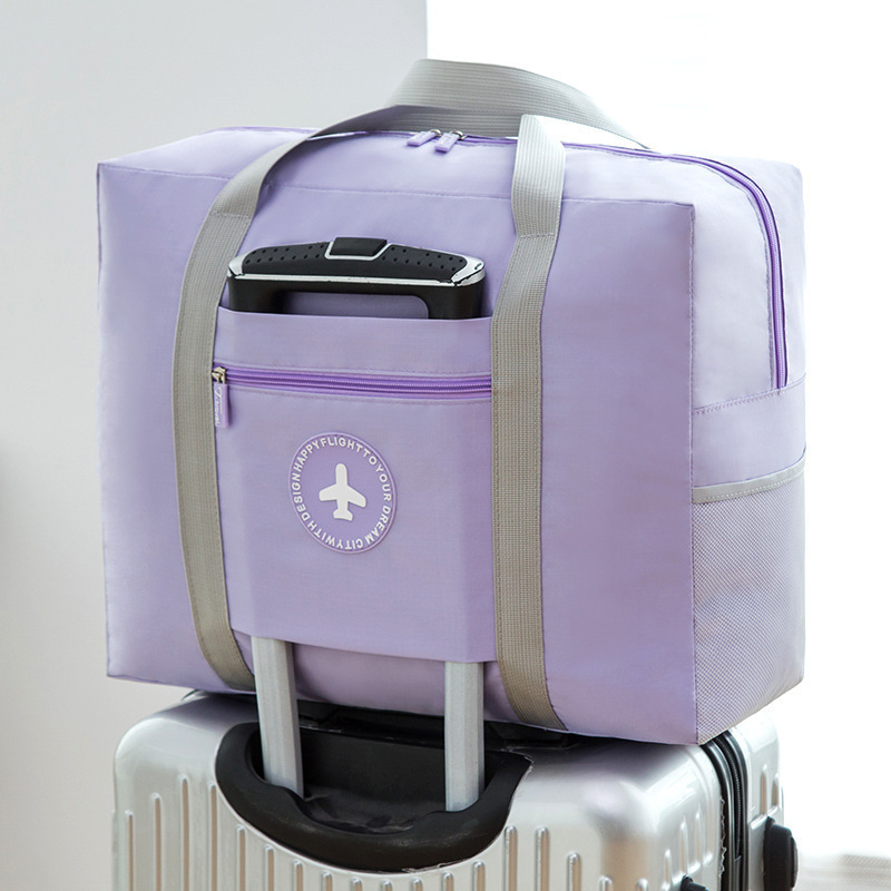 Large capacity travel bag, women's foldable luggage, maternity bag, storage bag, portable hand, simple round mark airplane bag