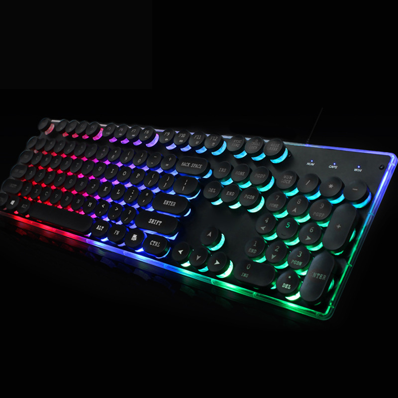 Cross-border wired keyboard and mouse set mechanical feel rainbow glow punk crystal round cap keyboard factory direct supply. 