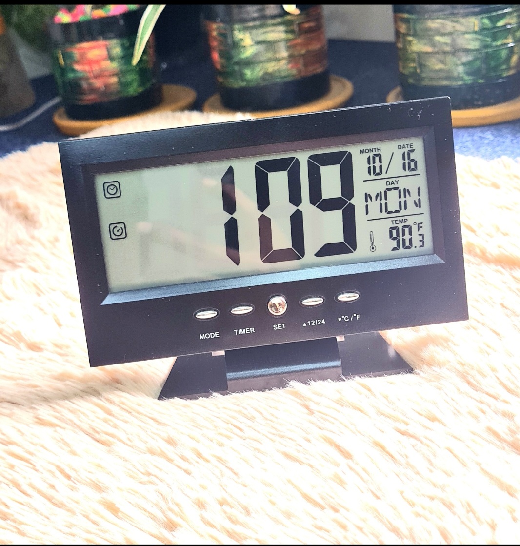 Voice Control Back-Light LCD Table Clock with Alarm. 