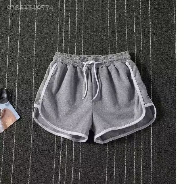 Leggings ultra shorts for men and women Douyin with the same drawstring tide brand three-point wide-legged home loose quick-drying pajama pants sweatpants. 