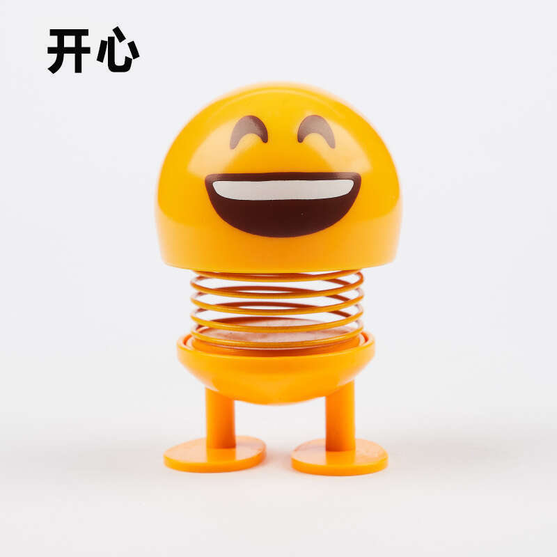 Spring doll Minions spring expression creative bobblehead car decoration. 