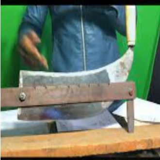 Hay or grass cutting hand machine. 