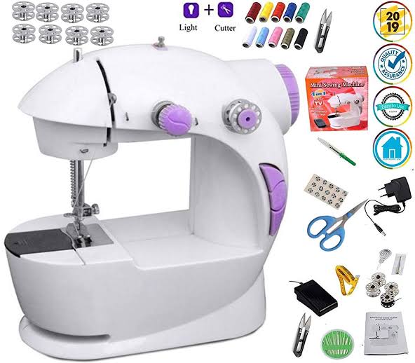 8 in 1 Mini Sewing Machine - Dual Speed Portable Mini Electric Pedal Double Threads Rewind Swing Machine. 