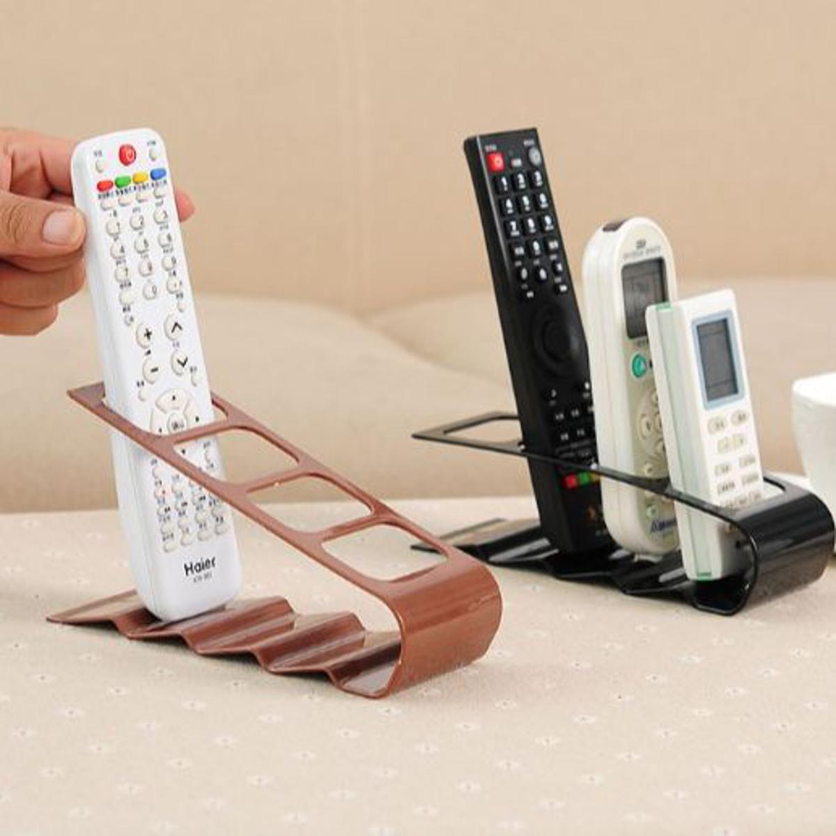 Korean version of Creative Four -grid remote control storage shelves Plastic desktop standing rack storage