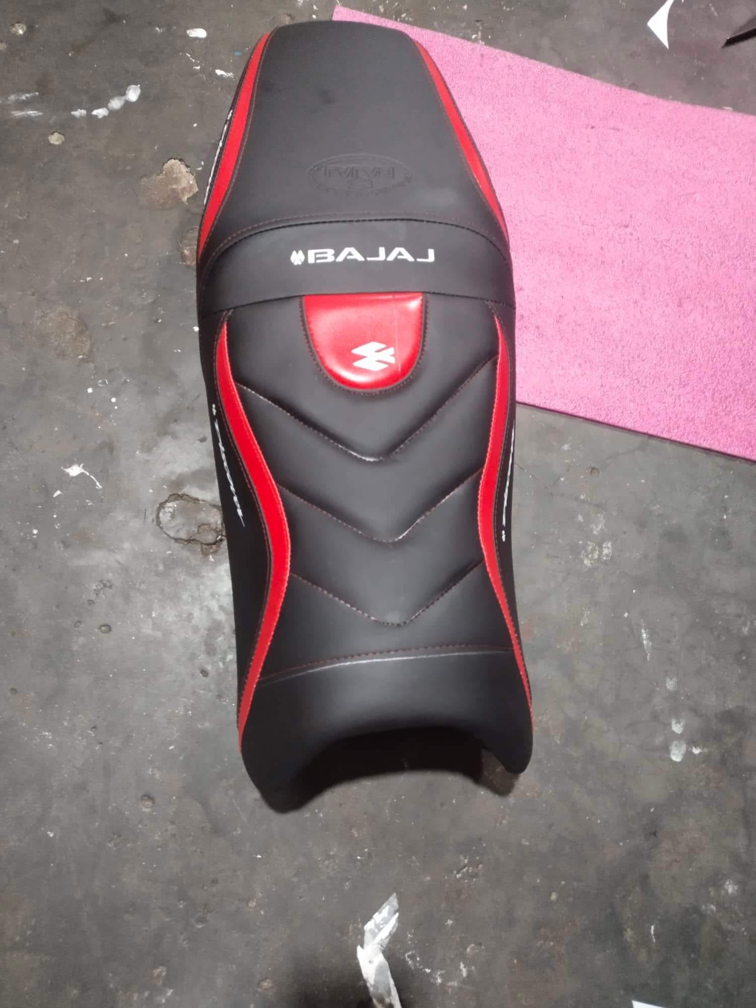 Bajaj Pulsar single disk red color premium modified seat cover. 