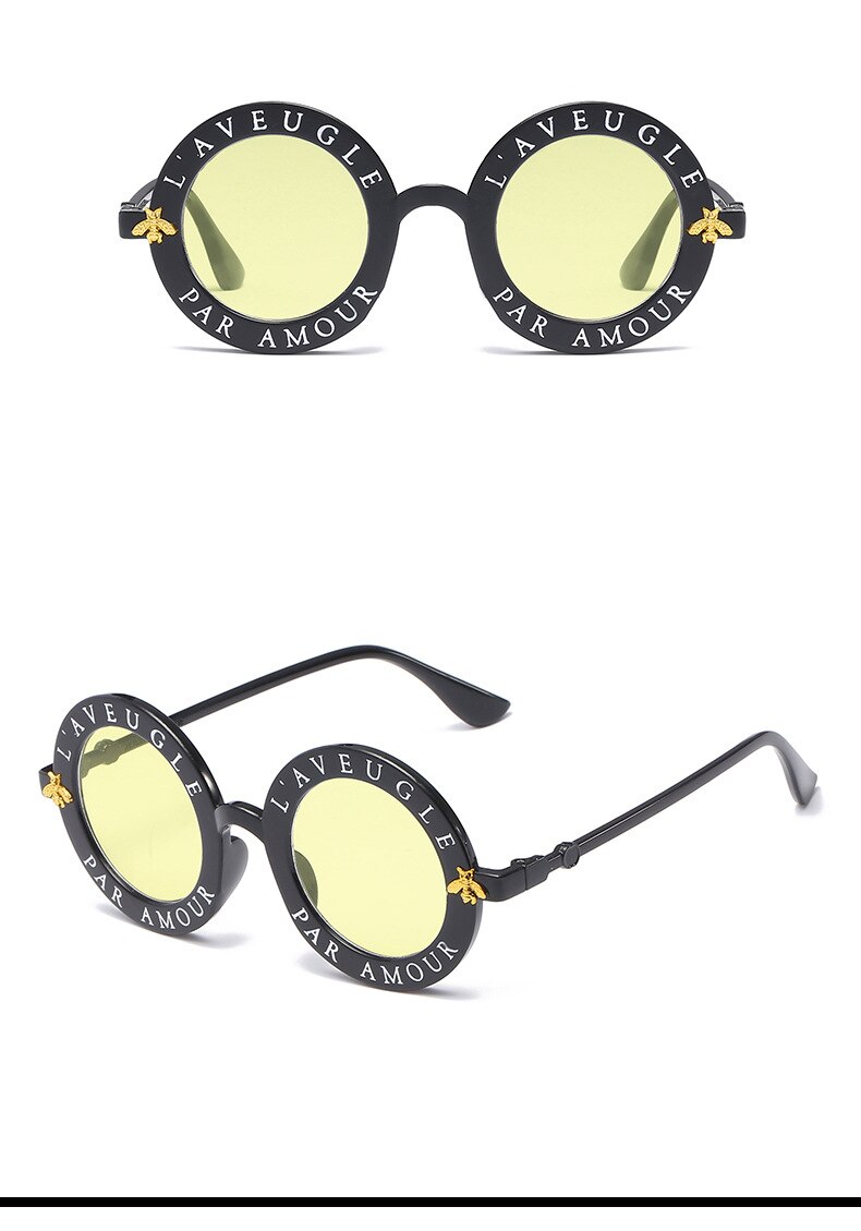 round sunglasses with writing