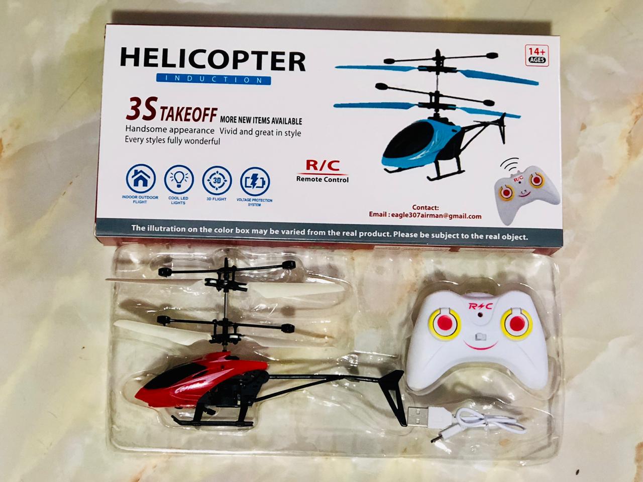 helicopter toy controlled by hand