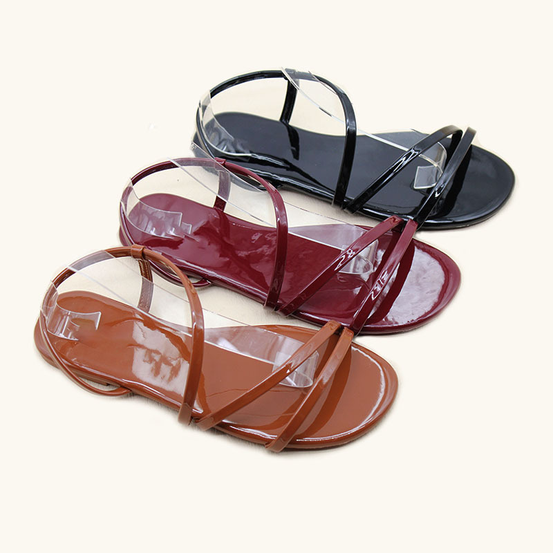 Foreign trade Chaozhou women's shoes fashion shiny thin strap flat casual sandals summer non-slip beach sandals